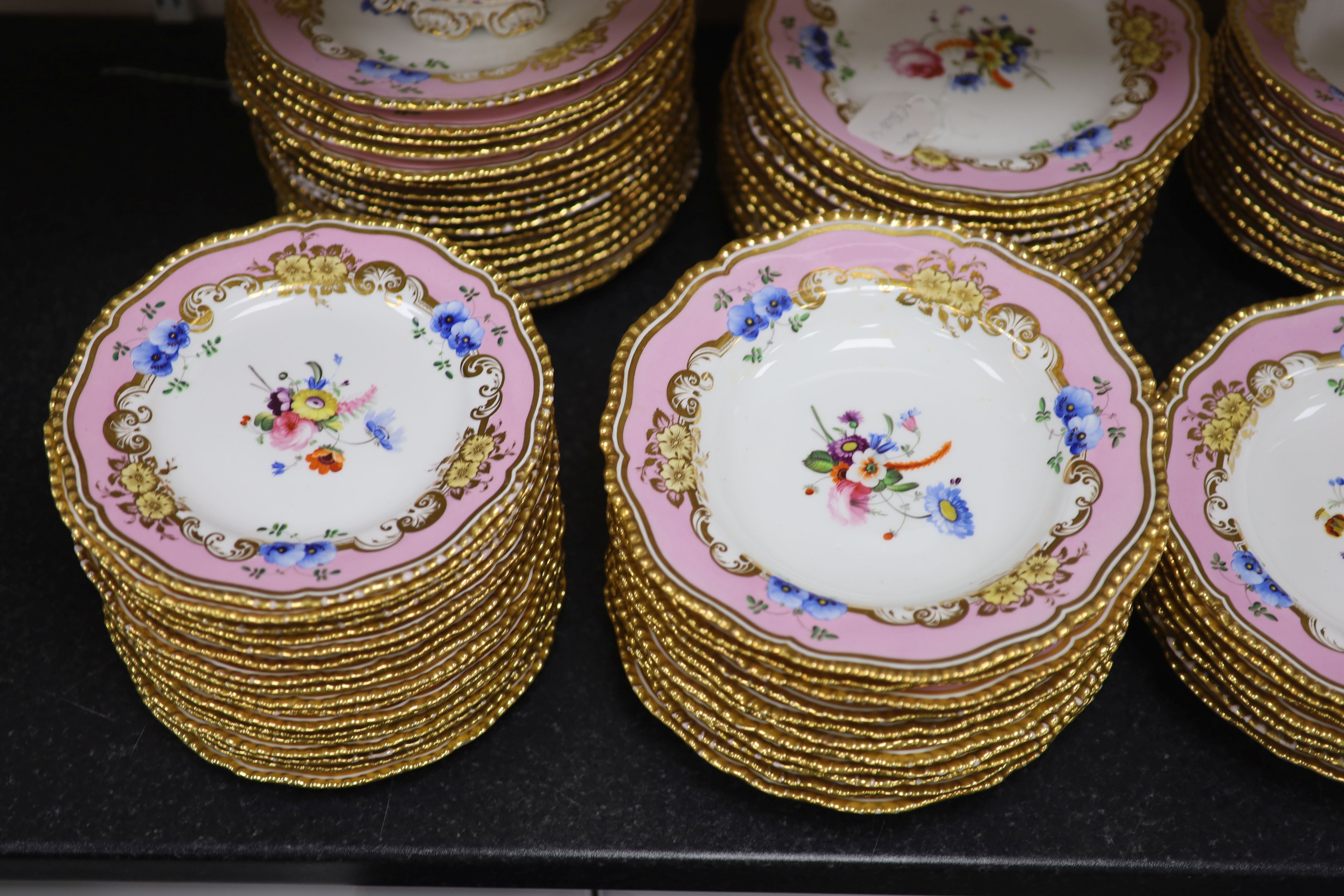 An extensive one hundred and thirteen piece English porcelain dinner and dessert service, c.1825-30,